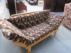 A wood framed drop end sofa