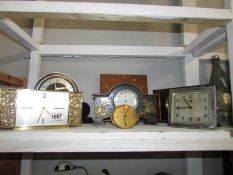 7 assorted mantel clocks (one shelf)