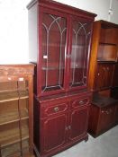 A glazed top cabinet