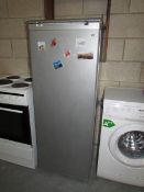 A Beko silver coloured fridge