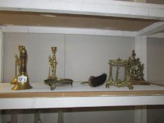 A mixed lot of brassware including candlesticks