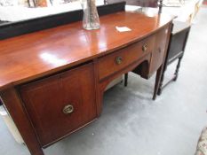 A mahogany inlaid sideboard