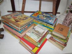 A mixed lot of annuals and other children's books