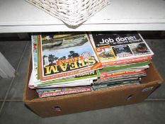 A large box of railway magazines