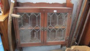 A astragal glazed wall cabinet