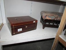 A foot stool and a wooden box