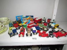 A mixed lot of die cast vehicles