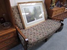 A cottage style 2 seater chair