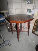 A mahogany octagonal table