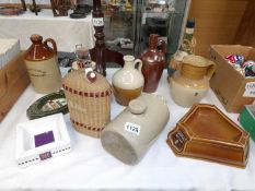 A mixed lot of stoneware bottles etc