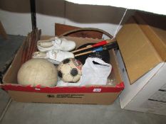 A box of sports equipment