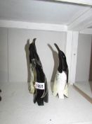 3 carved and polished cows horn penguins