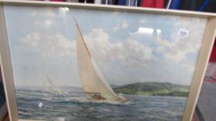 A framed and glazed picture of a racing yacht