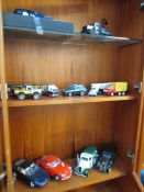 3 shelves of die-cast cars