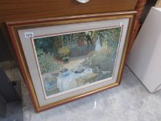 A framed and glazed Monet print le dejeuner