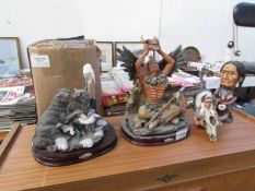 3 American Indian figures and a wolf group