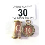 2 authentic 10/- notes set in 9ct gold charms