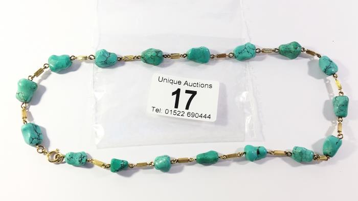 A retro turquoise stone necklace set in 14ct gold with 9ct gold clasp