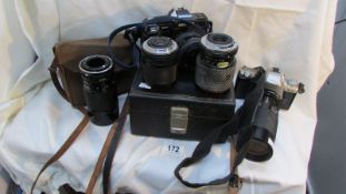 A collection of camera's and lenses including Minolta, Pentax, Yashica, Canon, Cinemax 8SE etc
