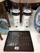 4 Dartington stemless wine glasses and an unused set of fish knives and forks by Sheffield
