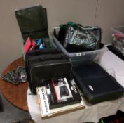 A quantity of fishing tackle and related items including floats, cases etc