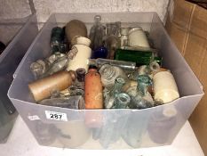 A box of vintage glass bottles