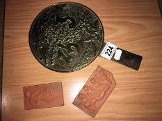 A Japanese bronze hand mirror and 2 small plaques