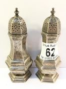 A pair of silver pepperettes