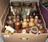 A box of vintage stone ware bottles