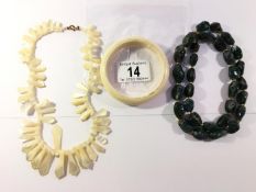 A Mother of Pearl necklace, agate necklace & ivory bangle