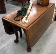 A mahogany drop leaf table