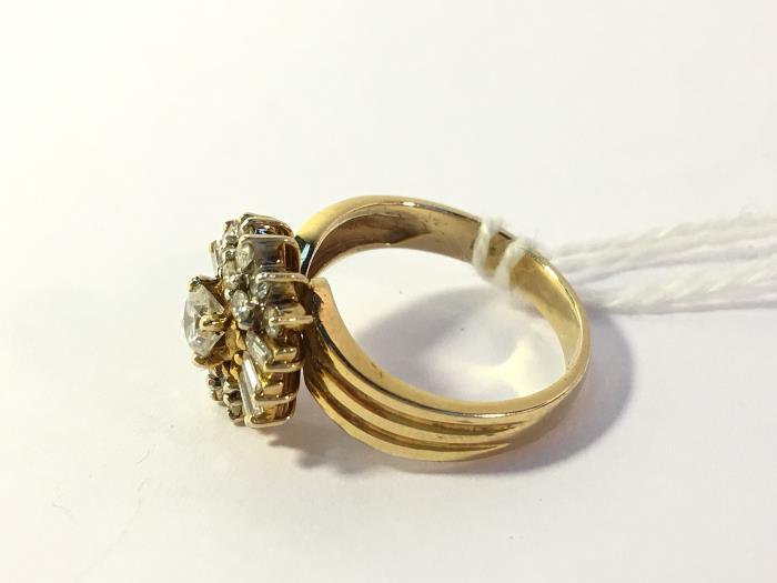 A high carat yellow gold ring of diamond baguettes and brilliants, size N, stamped 585 - Image 2 of 2