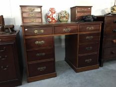 A mahogany double pedestal knee hole desk