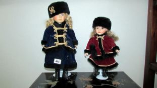 2 porcelain dolls in Russian costume