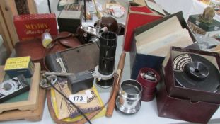 A quantity of vintage photographic equipment including camera's, lenses etc