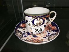 A Royal Crown Derby tea cup and saucer (saucer chipped)