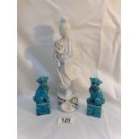 A Chinese 'Blanc de Chine' figure and a pair of Dogs of Foo