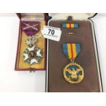 A United States of America Defence Distinguished Service medal and one other