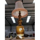 A hand turned one off wooden lamp base made in Bassingham, 1970's