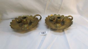 A pair of 19th century brass chamber candlesticks