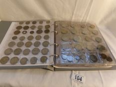 A collection of in excess of 450 world coins in an album