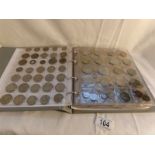 A collection of in excess of 450 world coins in an album