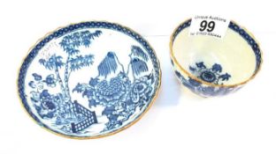 A 18th/19th century blue and white cup and saucer