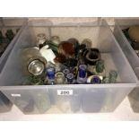 A box of vintage glass bottles