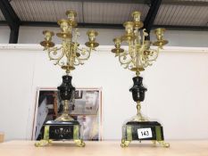 A pair of 5 branch gilded candelabra