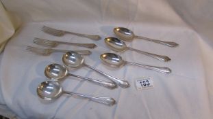 3 silver forks, 3 silver dessert spoons and 3 silver soup spoons