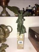 A 19th century Empire tour bronze mercy angel