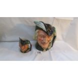 A medium and large Robin Hood Royal Doulton character jugs