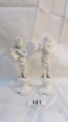 A pair of cherub musician figures