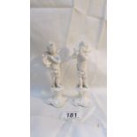 A pair of cherub musician figures